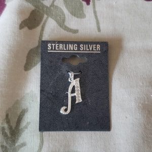A initial sterling silver charm